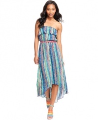 With a strapless design to keep you cool, an asymmetrical hem to keep you chic and a rainbow of stripes to keep you colorful, this dress has everything you need for a season of sun!