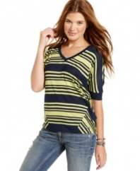 Panels of asymmetrical stripes at the sides add cool variation to this comfy-casual top from Tommy Girl!