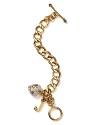 Juicy's starter charm bracelet gets the party started with a thick goldtone chain with crystal pavé heart and J charms.