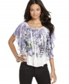 Amp up the flower power – and give your jeans a printed boost – with this poncho-gone-sublime from BCX!