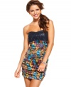 Get ready to party in this fun and colorful dress from Wishes Wishes Wishes! A solid-color sequin bust offsets the spunky print on this super-cute, strapless number!