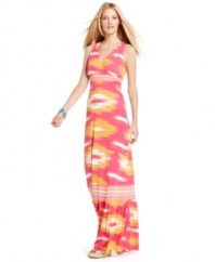INC's maxi dress makes a fashionable impression. Bold ikat print and vivid sunset colors evoke the best that summer has to offer!