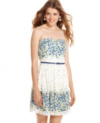 Spring into fresh style with this strapless dress from Trixxi, where colorful flowers bloom over a sweet, pleated design!