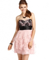 Dark accents add edge to this blush-tone party dress from Roberta, while a full, ruffled skirt and lace-covered bodice supply major feminine style!