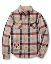 An updated take on classic plaid, this casual GUESS Kids button-down features a front logo and an edgy-cool zip pocket.