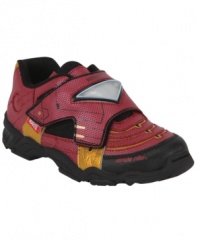 The light of day. He'll be able to guide anyone through darkness int these light-up Iron Man sneakers from Stride Rite.