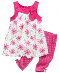 Pretty in print. Her beauty will blossom in this sweet floral tunic and polka dot print legging set from Nannette.