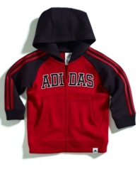 Zip up the newest fan in the family in sporty style with this athletic hoodie from adidas.