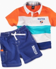 Sail on through in style. He'll get through the day comfortably in this cute polo and swim trunk set from Nautica.