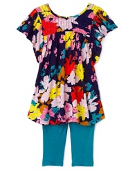 Little Ella injects some attitude into her summer wardrobe with vivid prints, flowing silhouettes and ruffle accents.
