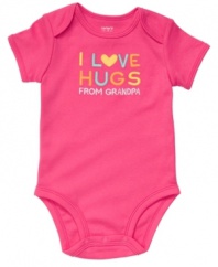 Snuggle in. It'll be no secret what one of her favorite things to get is with this precious bodysuit from Carter's.