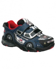 Show your muscle. These light-up Vroomz sneakers from Stride Rite are a cute choice for kicks, with durable construction and a tough muscle car design.