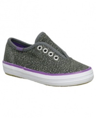Born to be wild. She'll love showing off her fun side with these animal-print slip-on shoes from Keds.