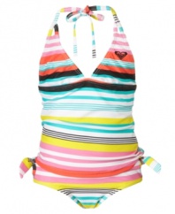 Halt! Everyone will stop and take notice of just how cute she is in this lively halter-style bikini from Roxy.
