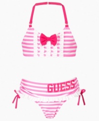 She'll be a striped standout in this sweet halter bikini from Guess.