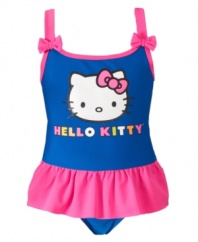 Dive into the fun. She'll be ready for some playtime in the sand and sun with this darling one-piece swimsuit from Hello Kitty.