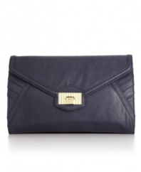 A modern style with sophisticated detail, it won't be hard to impress with this gorgeous Danielle Nicole oversized clutch. Chic side stitching and a textured goldtone plaque give this understated bag a perfectly polished finish.