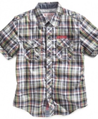 A sure bet. Exposed stitching against the muted plaid on this button-front shirt from Guess will become a favorite in his regular style rotation.