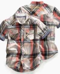 Off the cuff. Complement his casual style with the crisp plaid and roll-cuff sleeves on this shirt from Guess.