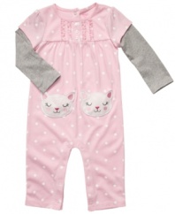 Keep her pretty in polka dots with this sweet coverall from Carter's.