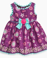 Liven up any day when you put her in this colorfully fun dress from Sweet Heart Rose.