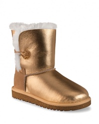 Plush meets pizzaz with these fabulous metallic UGG® boots with cozy sheepskin lining and suede heel guards.