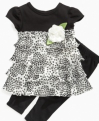 Prep her in pretty polka dots with this sweet dress and legging set from Sweet Heart Rose.