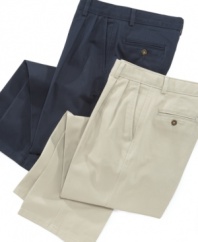 The perfect complement to any button-down or polo shirt, these classic pleated pants from Nautica are a must-have addition to his dressy wardrobe.