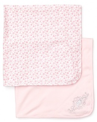 One solid and embroidered and one floral print, these luxe receiving blankets bring your little girl into the world in comfort and style.