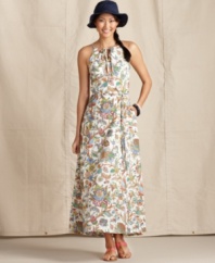 A stylized floral print brings this ultrachic maxi dress to life, from Tommy Hilfiger. Best of all -- it has pockets!