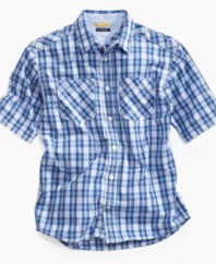 Breezy style. He can keep his cool underneath this short-sleeve poplin shirt from Tommy Hilfiger, the perfect last layer.