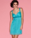 A sequined empire waistline and dreamy chiffon overlay unite gracefully on this dress from Ruby Rox!