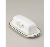 A charming addition to your Winterberry collection, this covered butter dish from Pfaltzgraff's holiday collection of dinnerware and dishes offers an elegantly coordinated look for holiday entertaining. A traditional holly berry pattern is painted on the cover's sides, and the dish's simple green rim completes the effect. (Clearance)