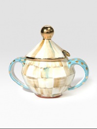 An elegant, one-of-a-kind serving piece, in hand-painted terra cotta with color-dragged checks and lustred gold accents, is a charmingly cheery addition to your tea party.Ceramic with golden lustre6 diam.; 8.5 tallHand washMade in the USA