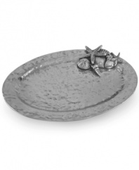 Seafood is always on the menu with the Coquilles platter from Star Home. Individually sculpted and finished by hand with starfish and shells, it lends whimsical charm to seaside homes.
