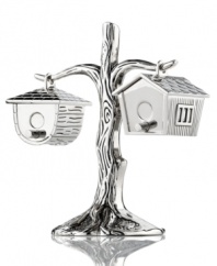 Perch these two little birdhouses on your table for a dash of salt, pepper and whimsy with every meal. Featuring radiant nickel-plated metal by Godinger.