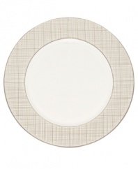 Dressed in a fine diamond grid of bronze and warm taupe, the Veneto dinner plates are tailored for formal dining and everyday elegance in bone china.