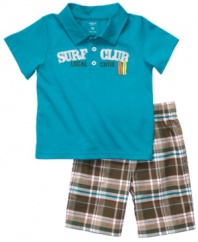 What a water baby! Start him with surf & sun style early in this cute polo shirt and short set from Carter's.