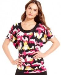 A softly scooped neckline and fluttery dolman sleeves make this colorful Alfani top the picture of modern style. Its bold print enlivens office attire and keeps your look chic for a night out.