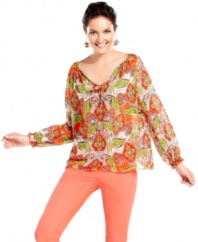 Channeling exotic locations, this vibrant top from Charter Club is a summery staple. Pair it with slim pants in a cheerful hue to make a statement.