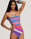 Channel a vintage vibe pool side with MARC BY MARC JACOBS' striped monokini. With metallic trim, this 70's-inspired suit looks leisurely with flat sandals and oversized shades.