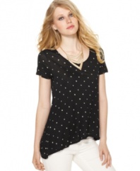 Kensie puts an edgier spin on this season's polka-dot print trend with a cool asymmetrical hem and a slouchy, oversized fit!