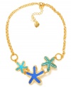 Dive deep for funky style. This Betsey Johnson frontal necklace features turquoise and blue starfish pendants accented with crystals. Crafted in gold tone mixed metal. Approximate length: 16 inches + 3-inch extender. Approximate drop: 1-1/2 inches.