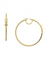 Golden tones with subtle sparkle. These hoop earrings from Vince Camuto are embellished with shimmering crystal stones. Crafted in gold tone mixed metal. Approximate diameter: 2-1/2 inch.