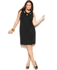 A cutout neckline lends a sassy feel to INC's sleeveless plus size dress-- wear it from day to date night!