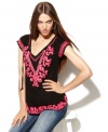 INC's embroidered tunic adds an air of relaxed glamour to any outfit! Subtle beading gives this top extra shine, too.