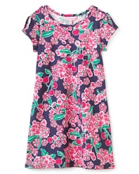 Blooming with bold floral prints, this simple scoop neck dress makes a lovely addition to her warm-weather wardrobe.