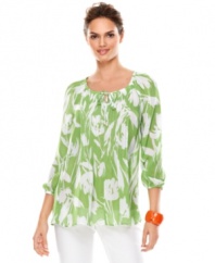 Be sure to pack this chic Charter Club top for your next getaway -- the floral print on sheer fabric looks great paired with a cami and white pants!