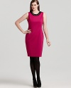 Showcase the glittering crystal embellished contrast neckline of this elegant Tahari Woman sheath dress by pairing the rose-hued silhouette with black stockings and glossy patent pumps.