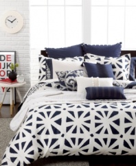 Create a serene setting in your bedroom with the Echo African Sun comforter set. Navy and white hues intertwine to create a landscape of abstract, triangle designs.